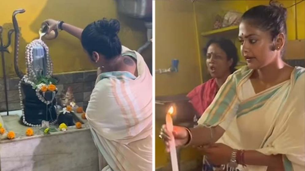 ভোট কেন্দ্রে পুজা করছেন সায়নী